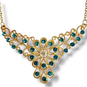 Betsey Johnson Gold and Blue Necklace with Intricate Design